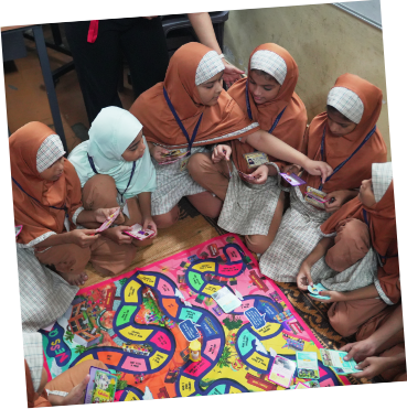 Girls playing a board game